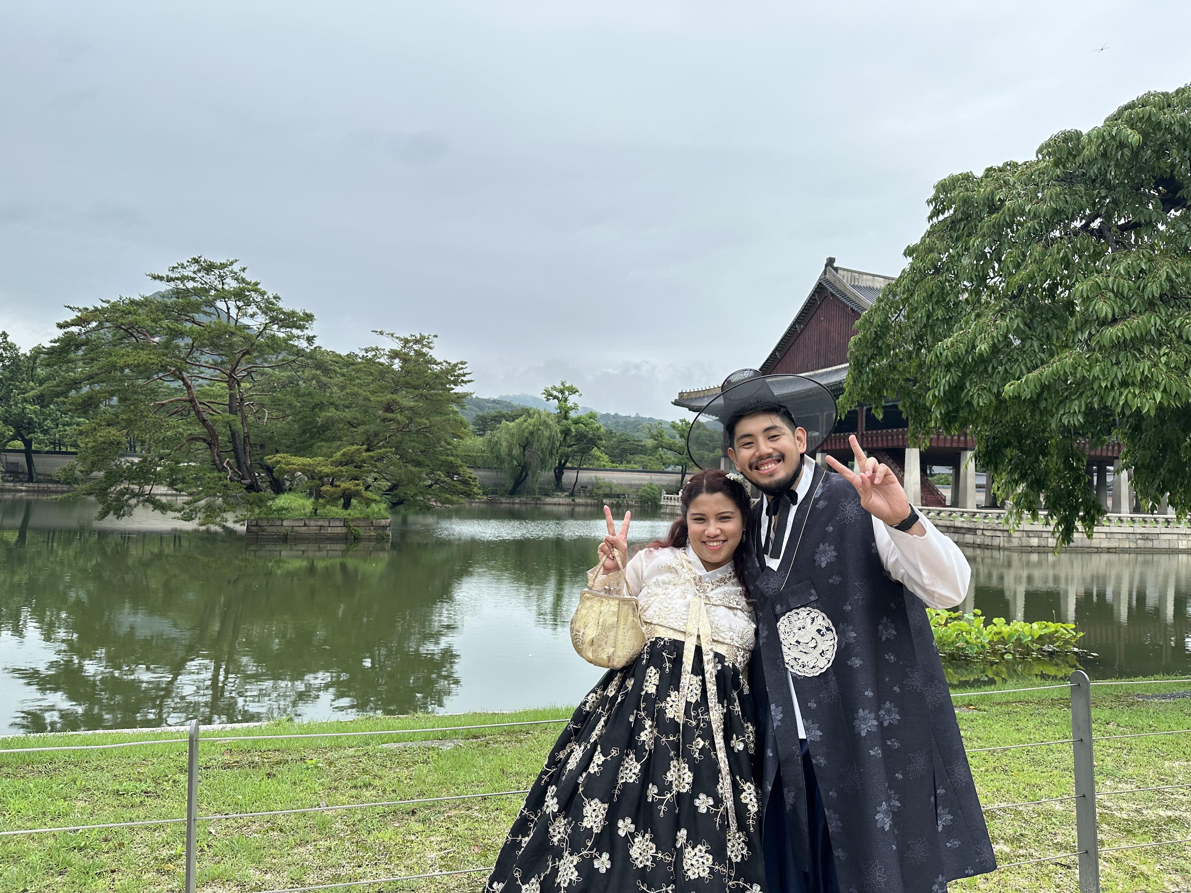 Wearing hanbok by the palace lake in Korea